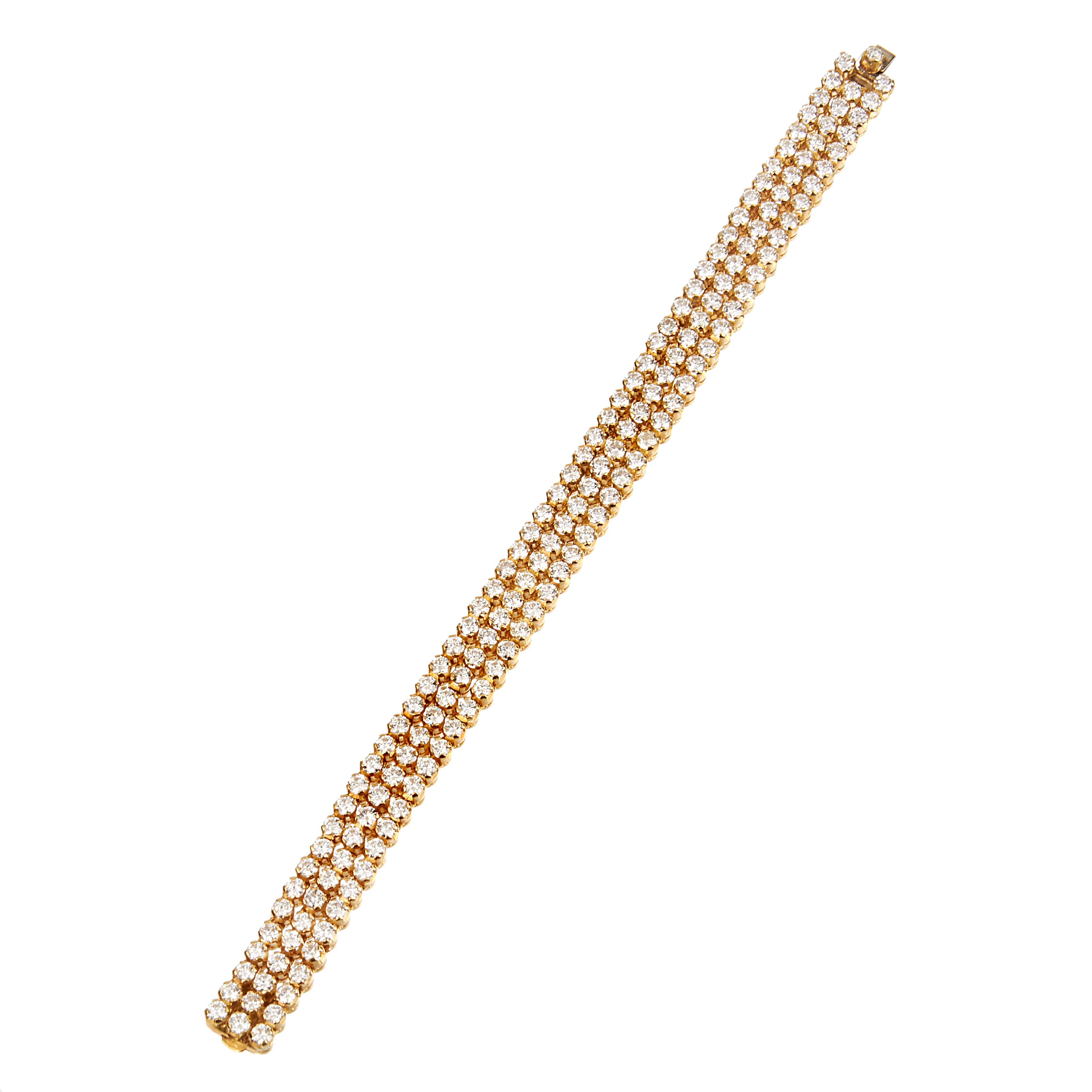 Importante bracciale tennis in oro giallo 18 kt e diamanti