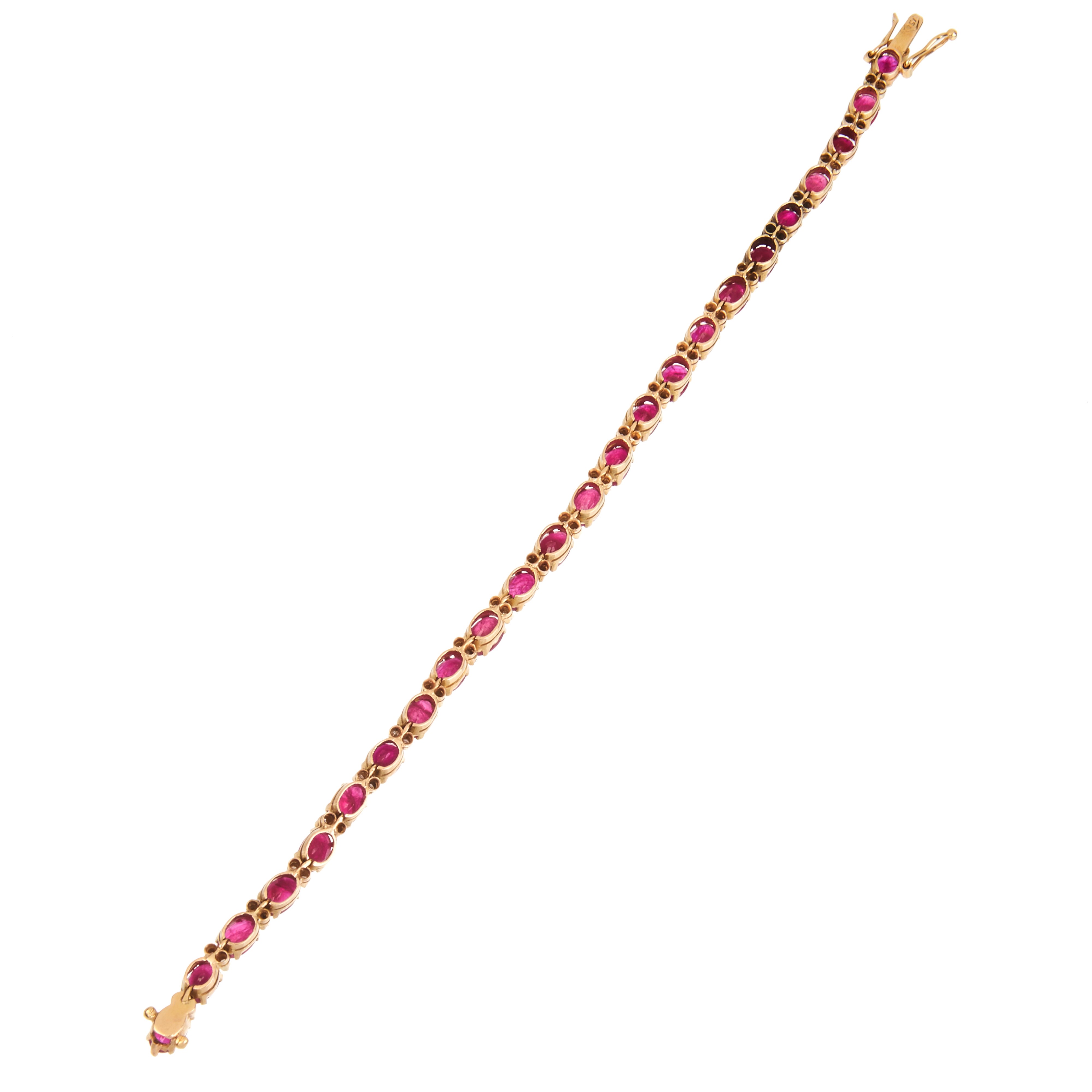 Bracciale tennis in oro giallo 18 kr, diamanti e rubini