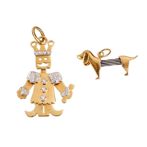 Large King pendant in 18 kt yellow gold, white gold and diamonds and Dachshund pendant in gold and metal