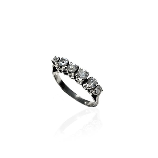 Riviere in 18 kt white gold and diamonds