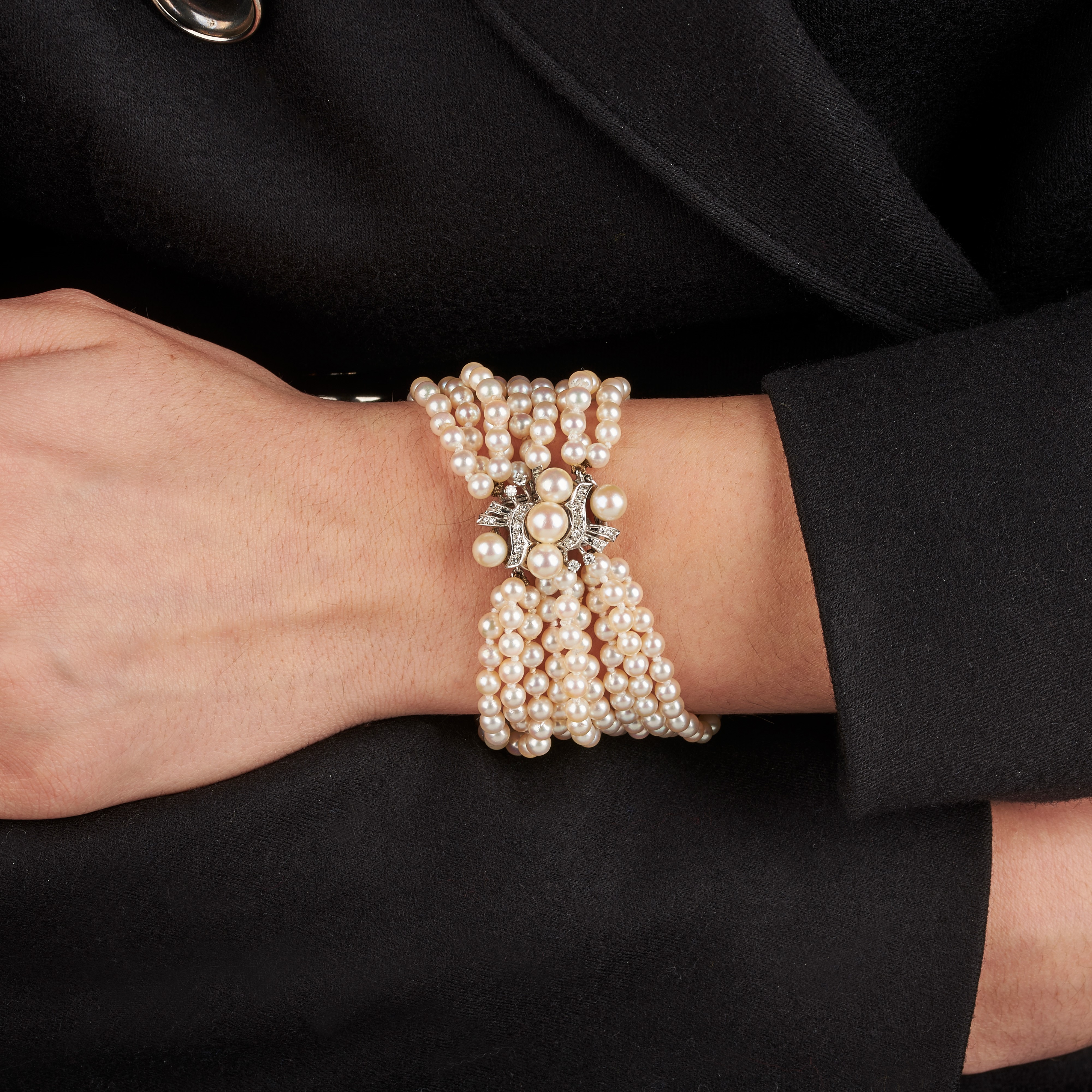 Bracciale multifilo in perle coltivate, oro bianco 14 kt e diamanti