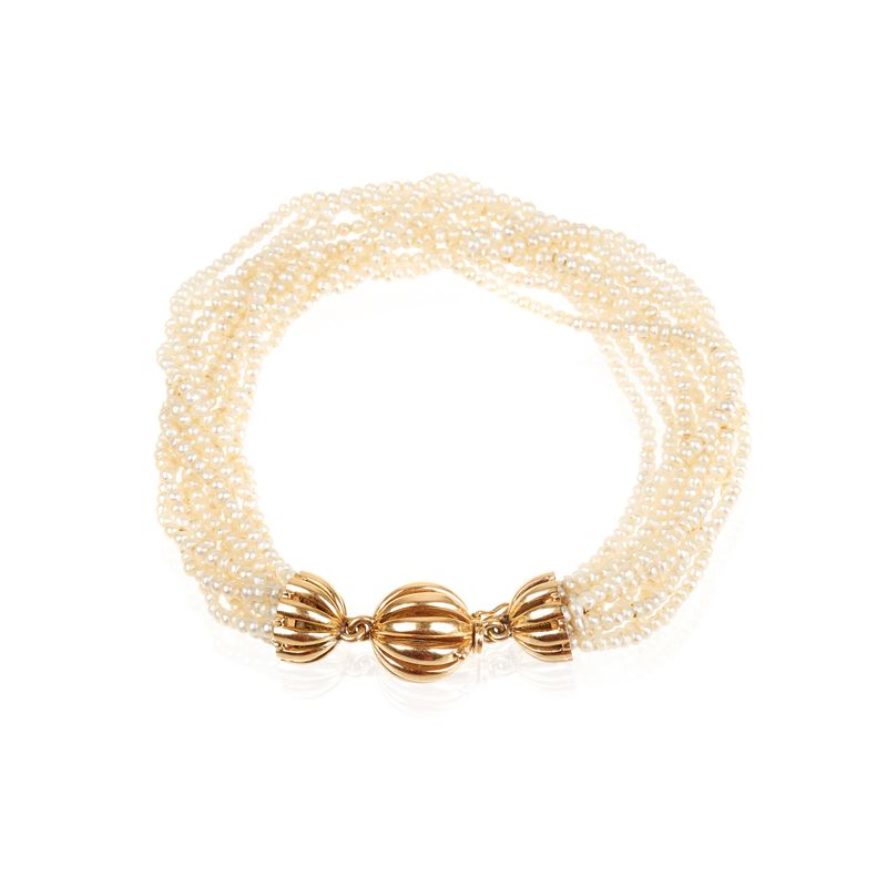 Bracciale millefili in microperle e oro giallo 18 kt