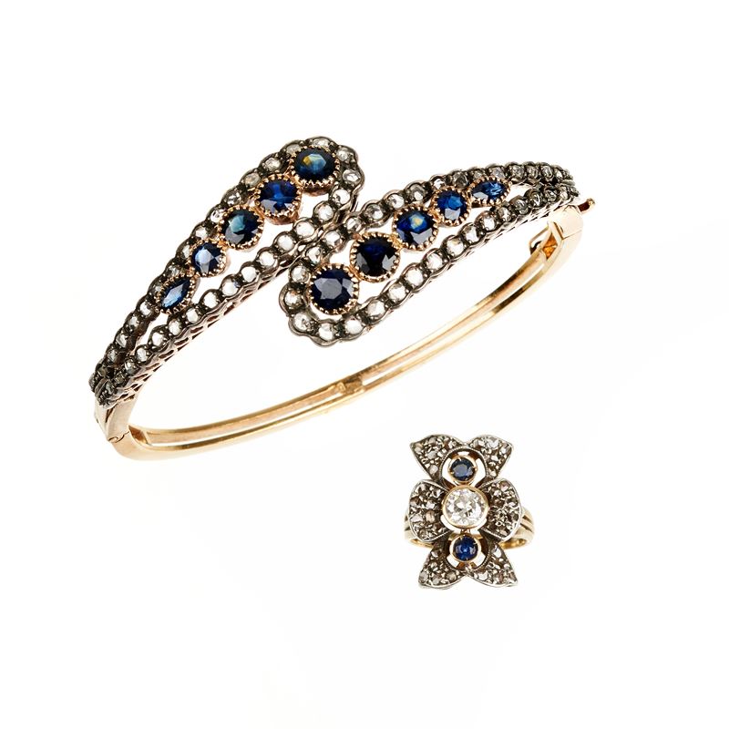 Grande bracciale contrariè in oro giallo 18 kt, argento, diamanti e zaffiri e anello en suite