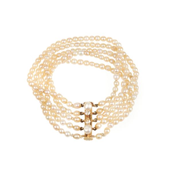 Millefili bracelet in cultured pearls, 18 kt yellow gold and diamonds