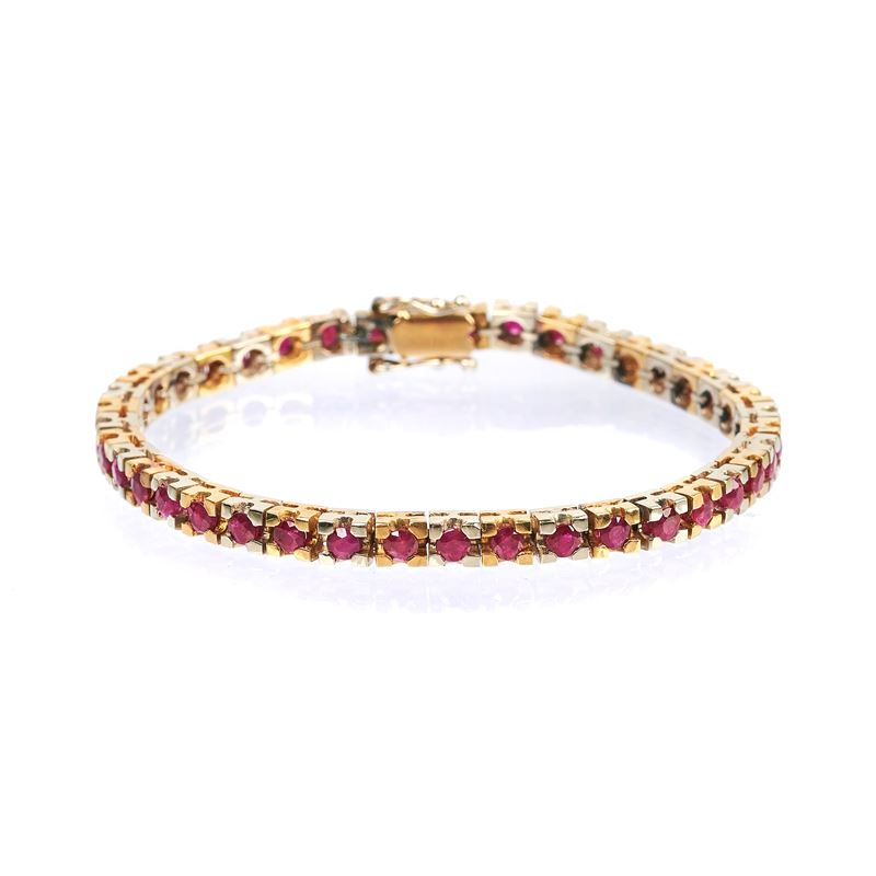 Bracciale tennis in oro giallo e oro bianco 18 kt e rubini