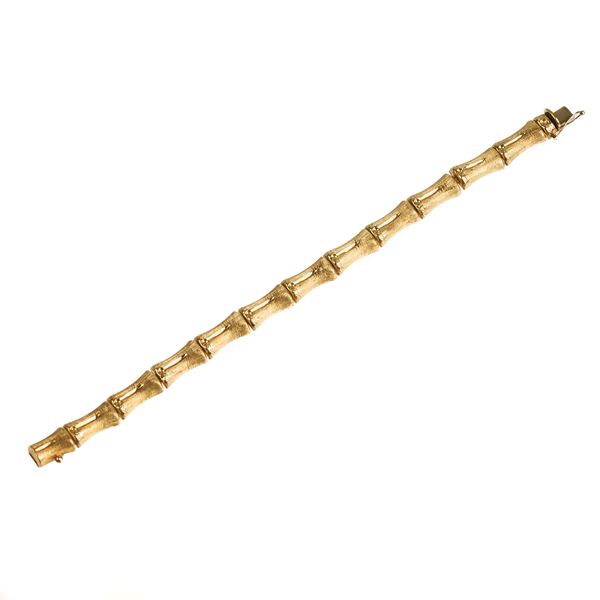 Imitation bamboo bracelet in 18 kt gold