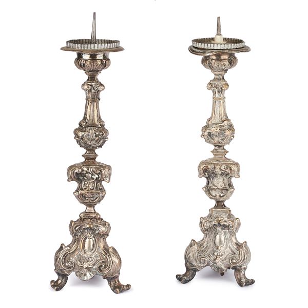 Pair of silver metal candlesticks