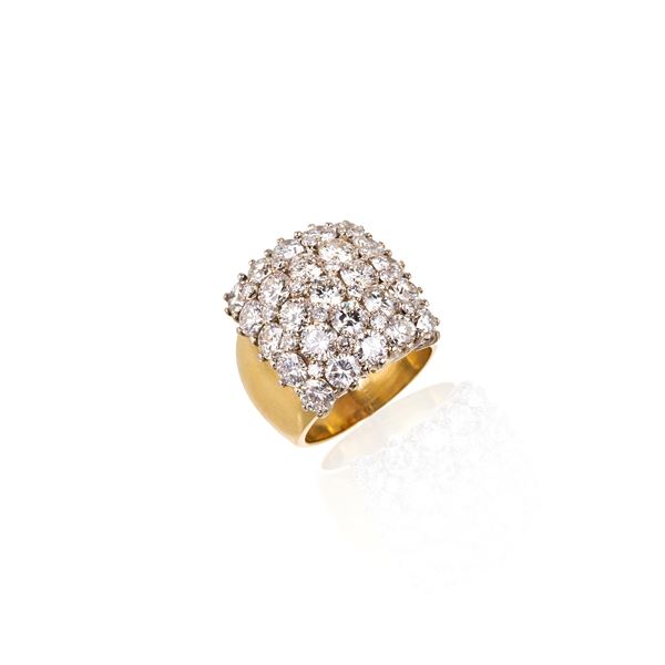 Importante anello a fascia in oro giallo 18 kt e diamanti