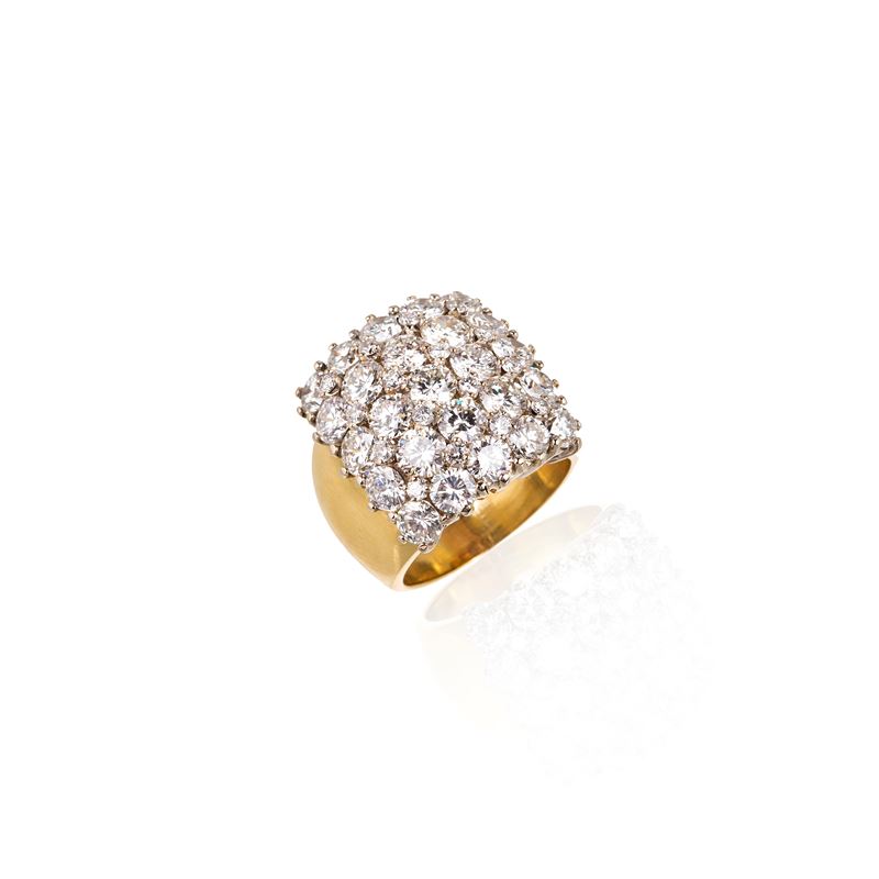 Importante anello a fascia in oro giallo 18 kt e diamanti