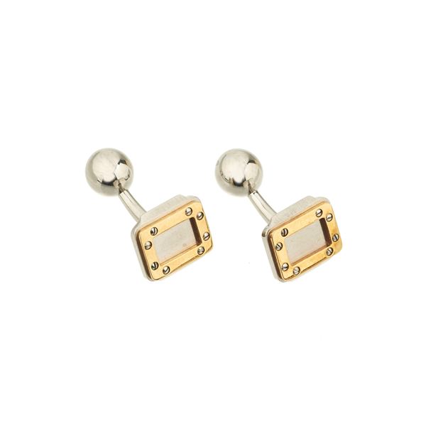 CARTIER - Pair of metal twins and 18 kt yellow gold