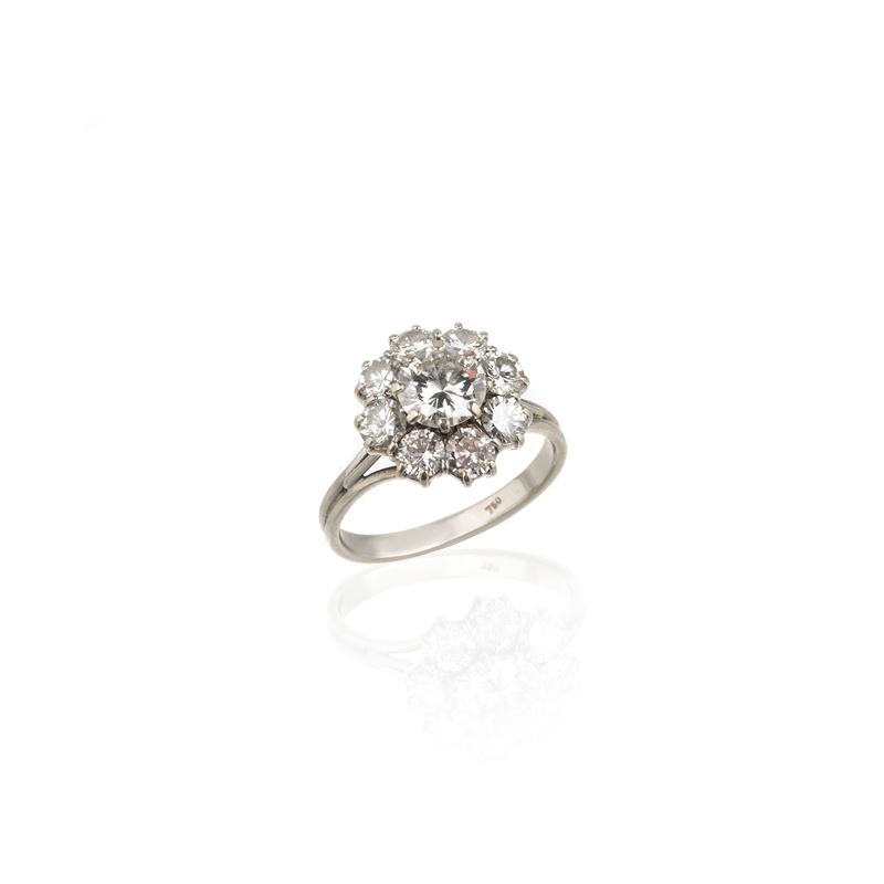 Anello a margherita in oro bianco e diamanti
