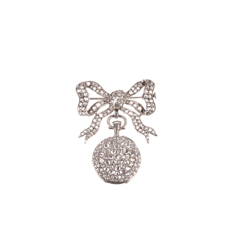 Spilla a fiocco con orologio in oro bianco 18 kt e diamanti