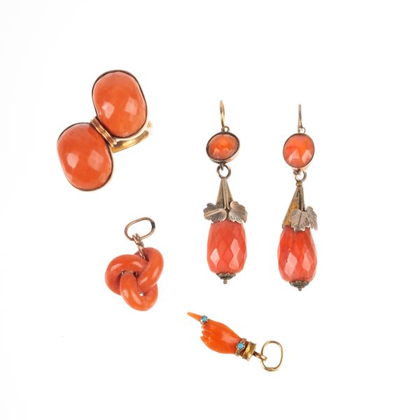 Pair of earrings and two low gold pendants a gold and low gold ring with red coral