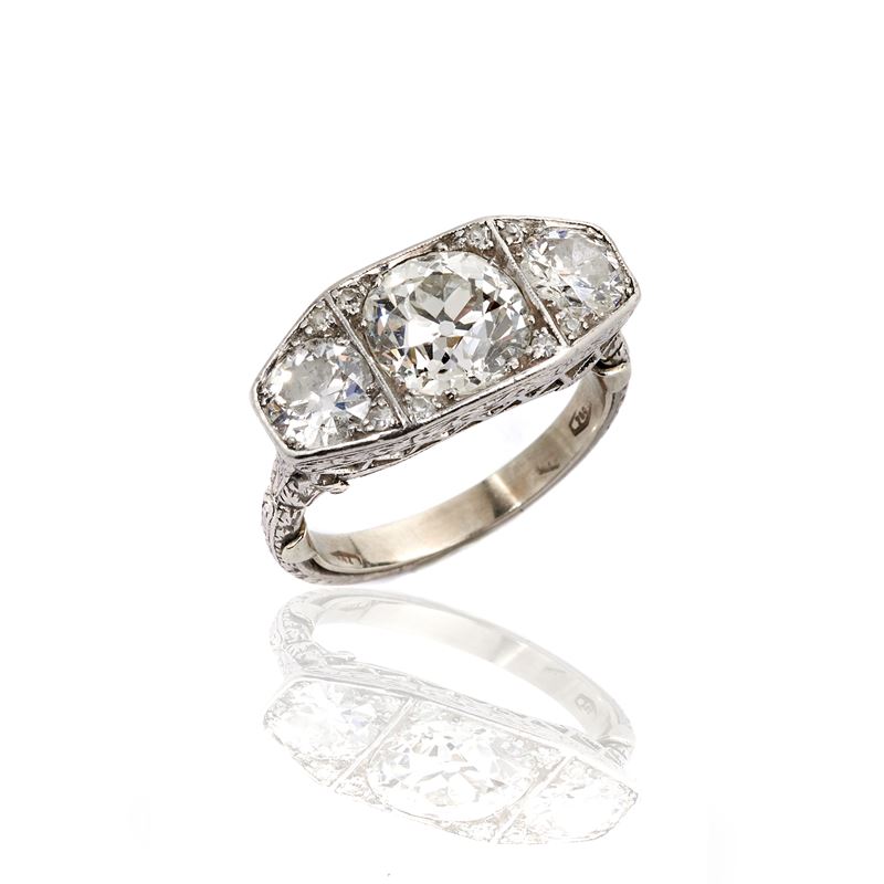 Anello Trilogy in platino e diamanti