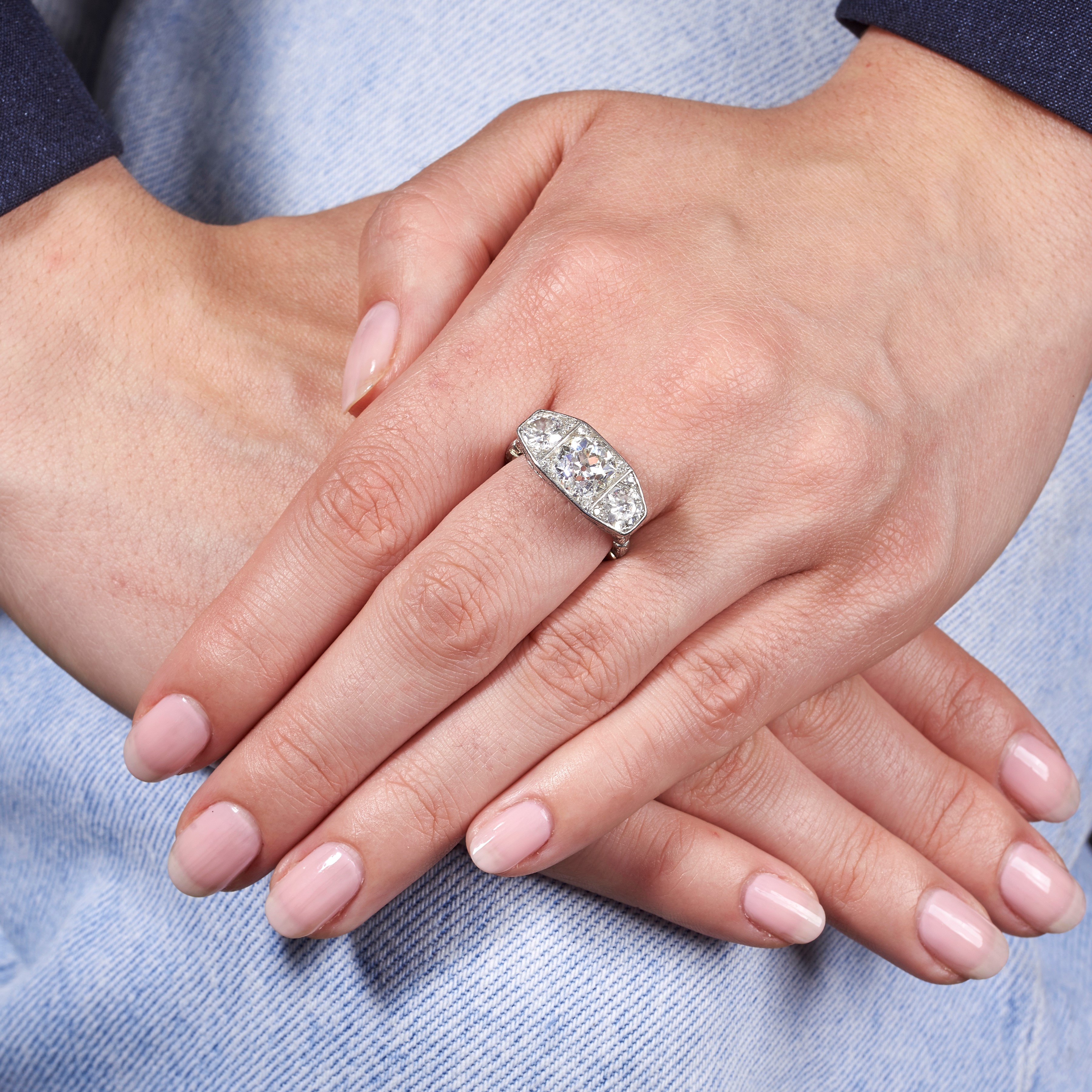 Anello Trilogy in platino e diamanti