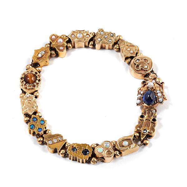 14 kt yellow gold bracelet and stones
