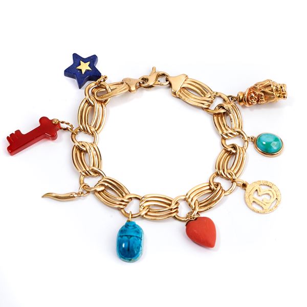18 kt yellow gold mesh bracelet with gemstone charms