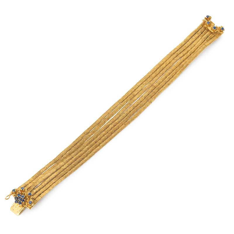 Bracciale in oro giallo satinato 18 kt e zaffiri