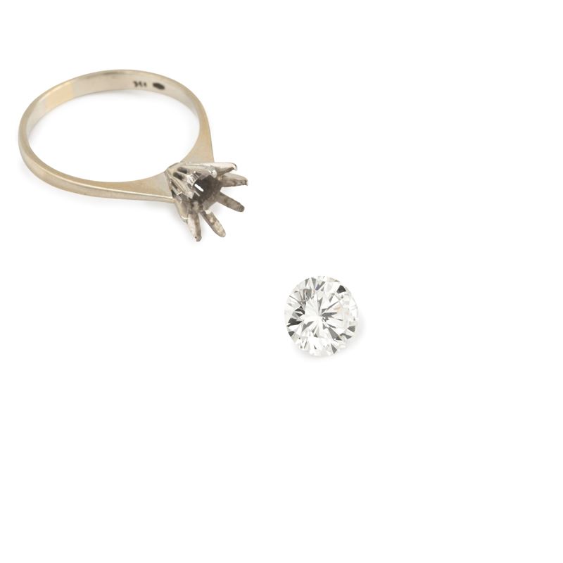 Anello solitario in oro bianco 18 kt e diamante