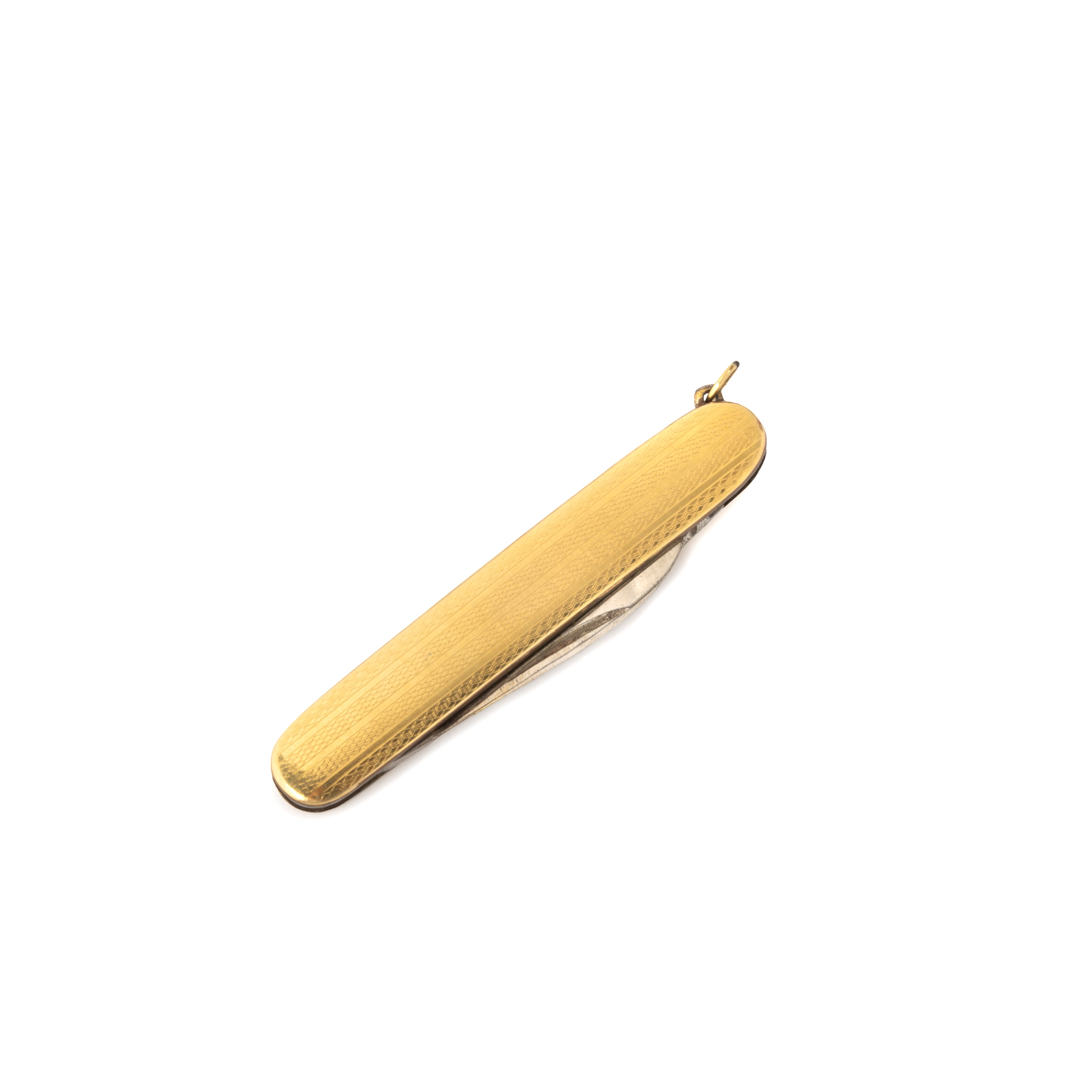 Coltellino in metallo rivestito in oro giallo 18 kt, smalto bianco e pietra verde