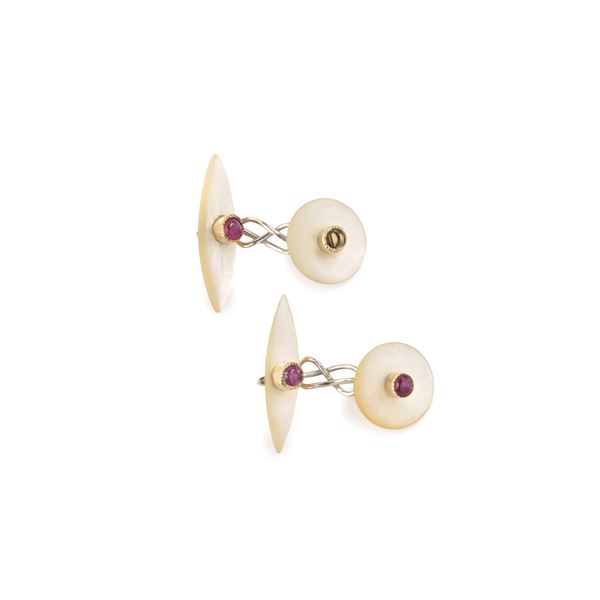 Pair of 18kt white gold cufflinks with mother-of-pearl and rubies