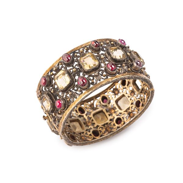 Alto bracciale rigido in oro giallo 18 kt, argento, granato e quarzo giallo