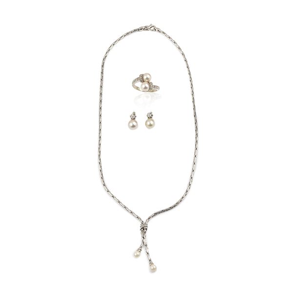 18kt white gold, diamond and pearl earrings, necklace and contrariè ring