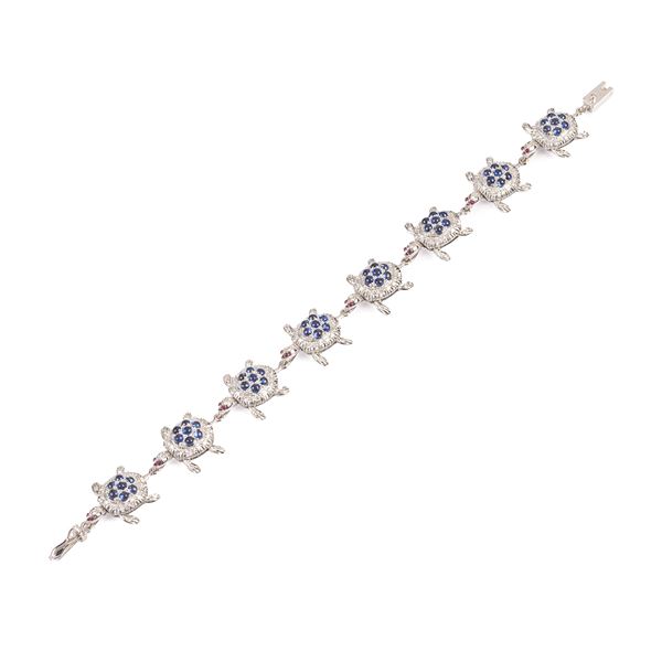 Turtle bracelet in 18kt white gold, diamonds and sapphires