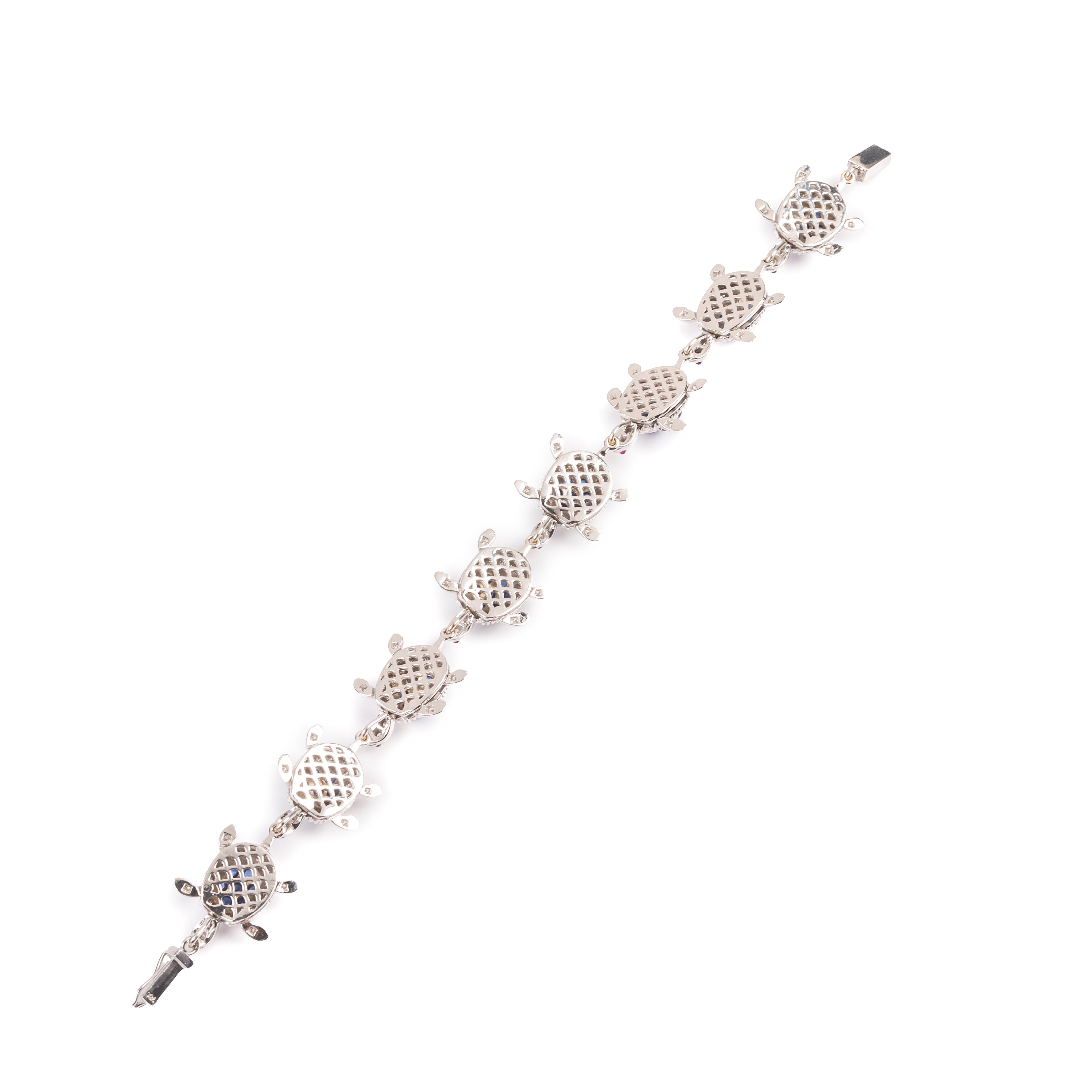 Bracciale tartarughe in oro bianco 18 kt, diamanti, rubini e zaffiri