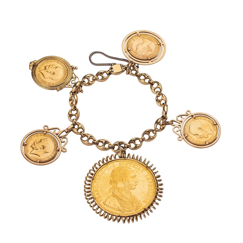Bracciale a maglia marina in oro giallo 18 kt con quattro sterline e 4 ducati del 1915 "Francesco...