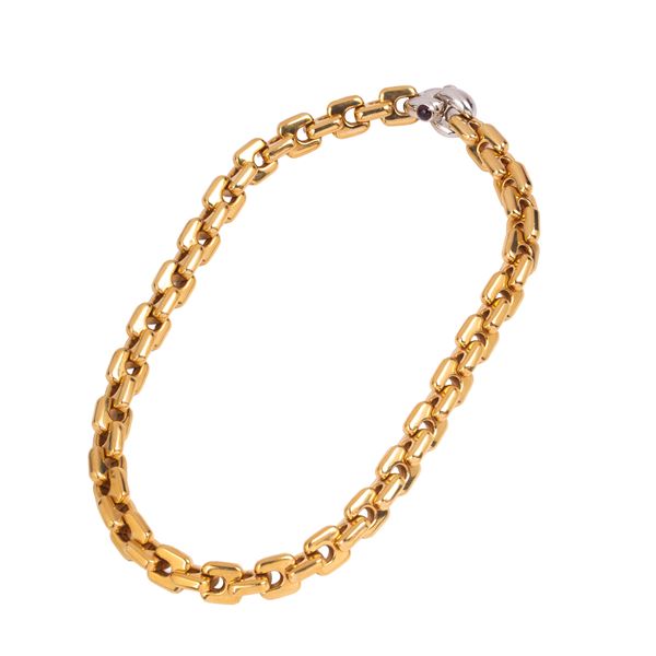 Large 18kt yellow and white gold intertwined link necklace with garnets