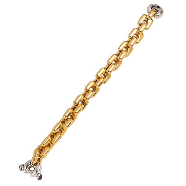 18kt yellow and white gold braided link bracelet with garnets