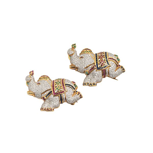 Pair of Elephant clips in 18kt yellow gold, rubies, emeralds, sapphires and diamonds