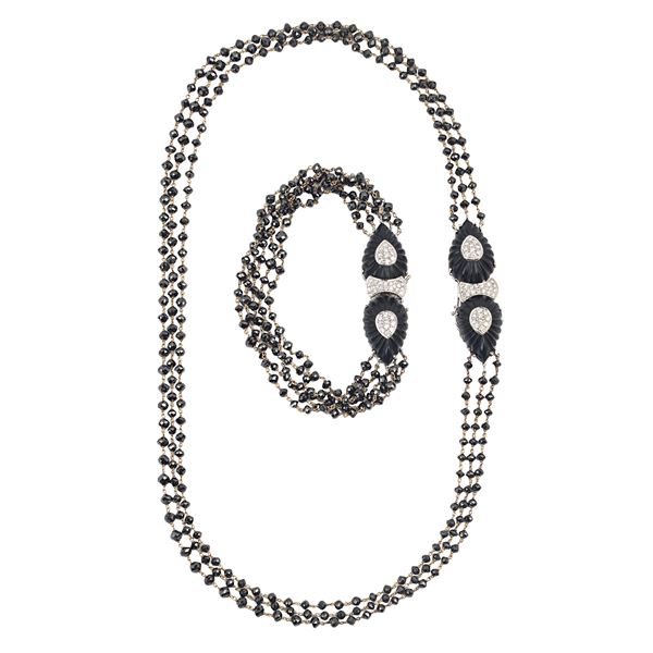 18kt white gold necklace and bracelet, black diamonds, diamonds and onyx