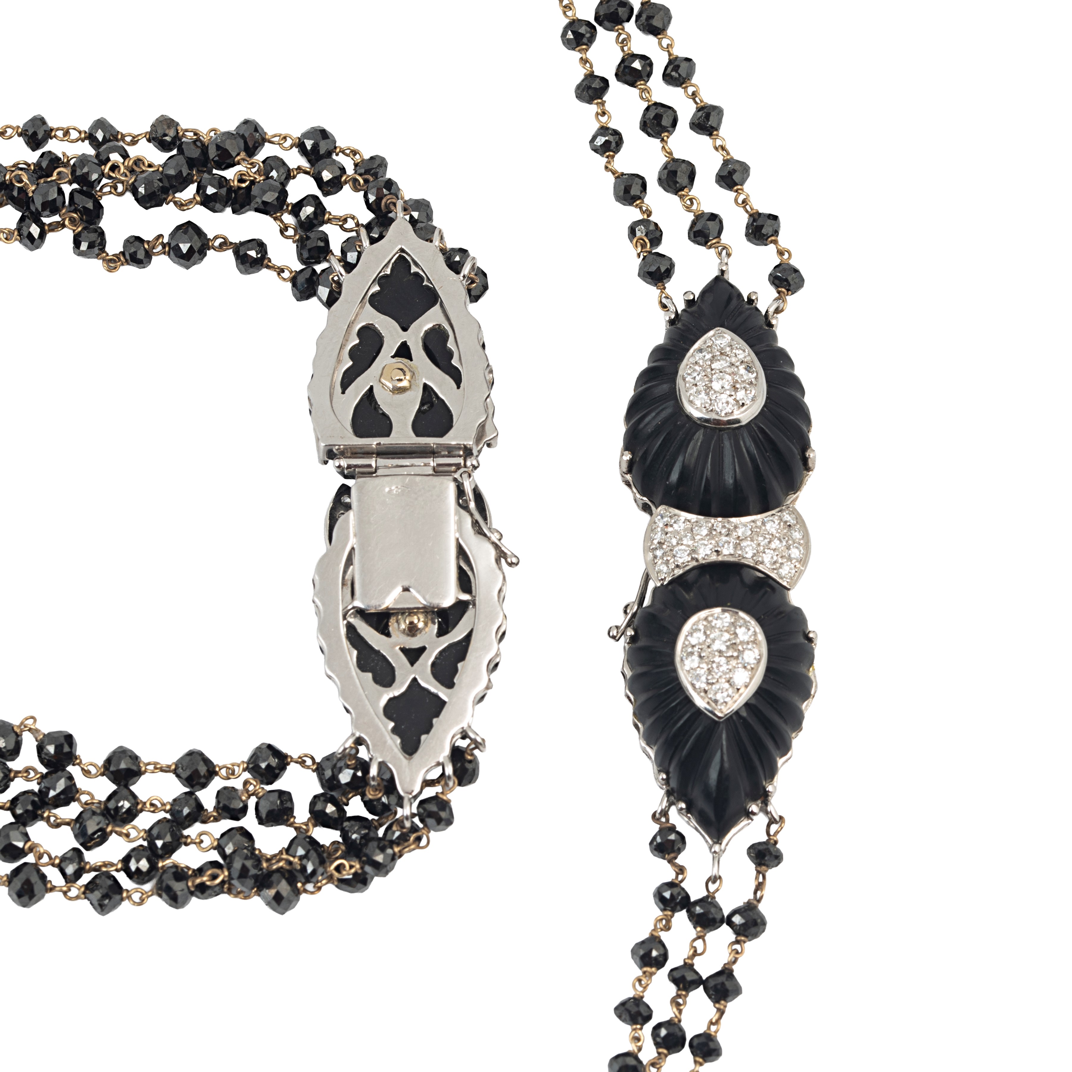 Collana e bracciale in oro bianco 18 kt, diamanti neri, diamanti e onice