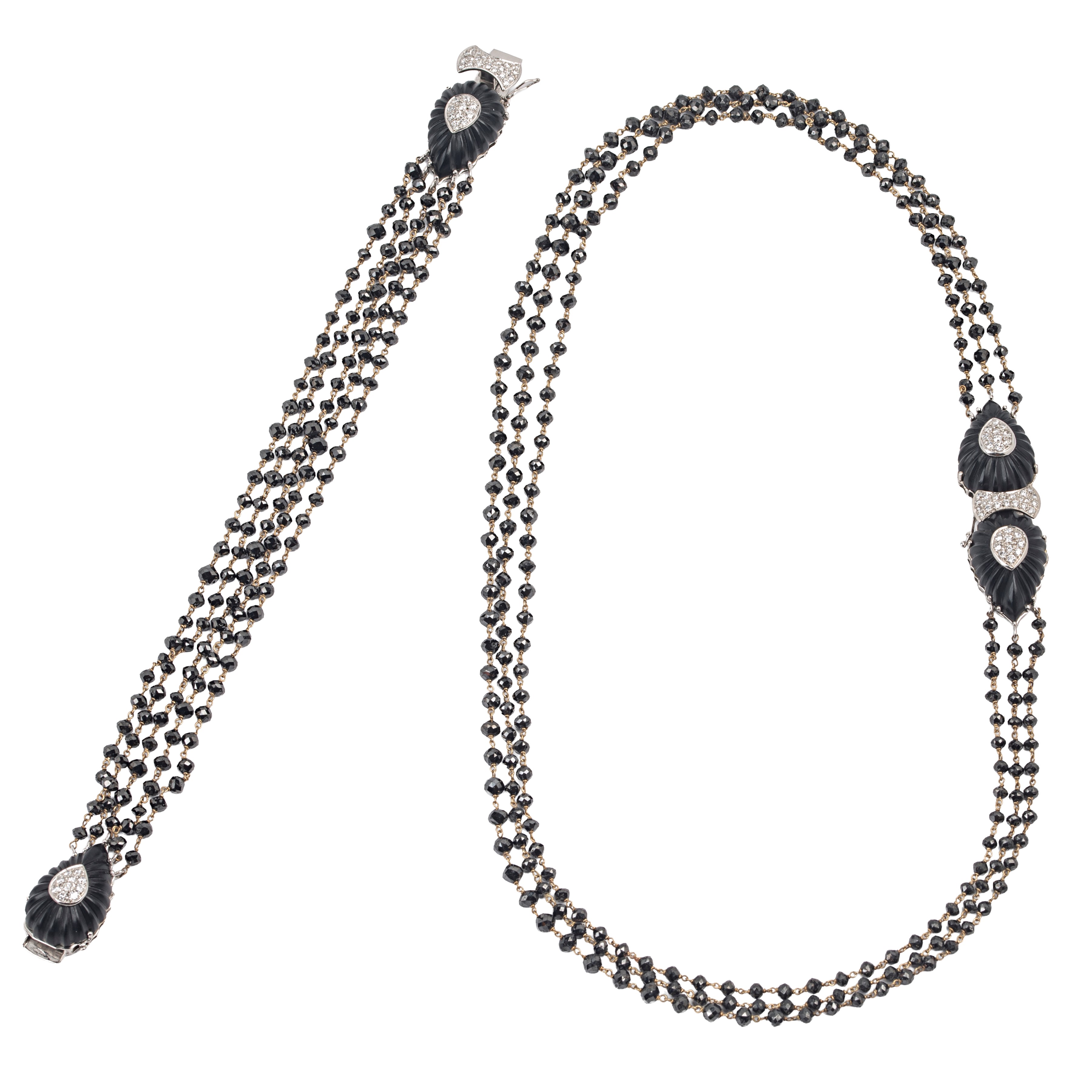 Collana e bracciale in oro bianco 18 kt, diamanti neri, diamanti e onice