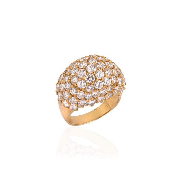 Large domed ring in 18 kt yellow gold and diamonds