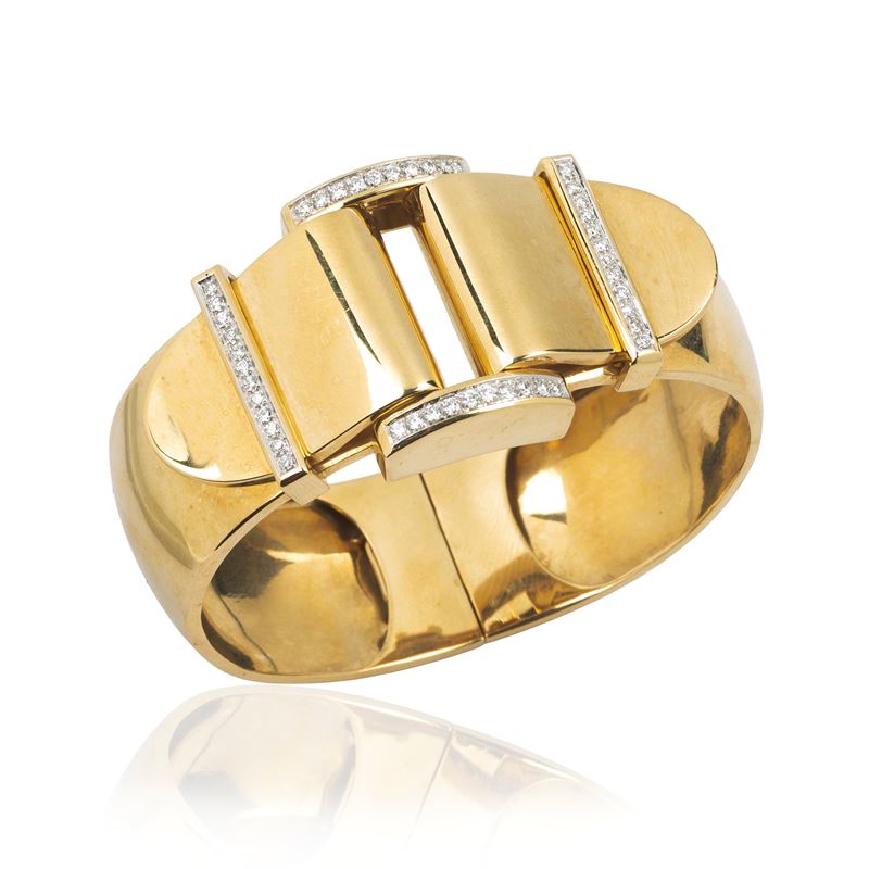Grande bracciale a fibbia in oro giallo 18 kt e diamanti