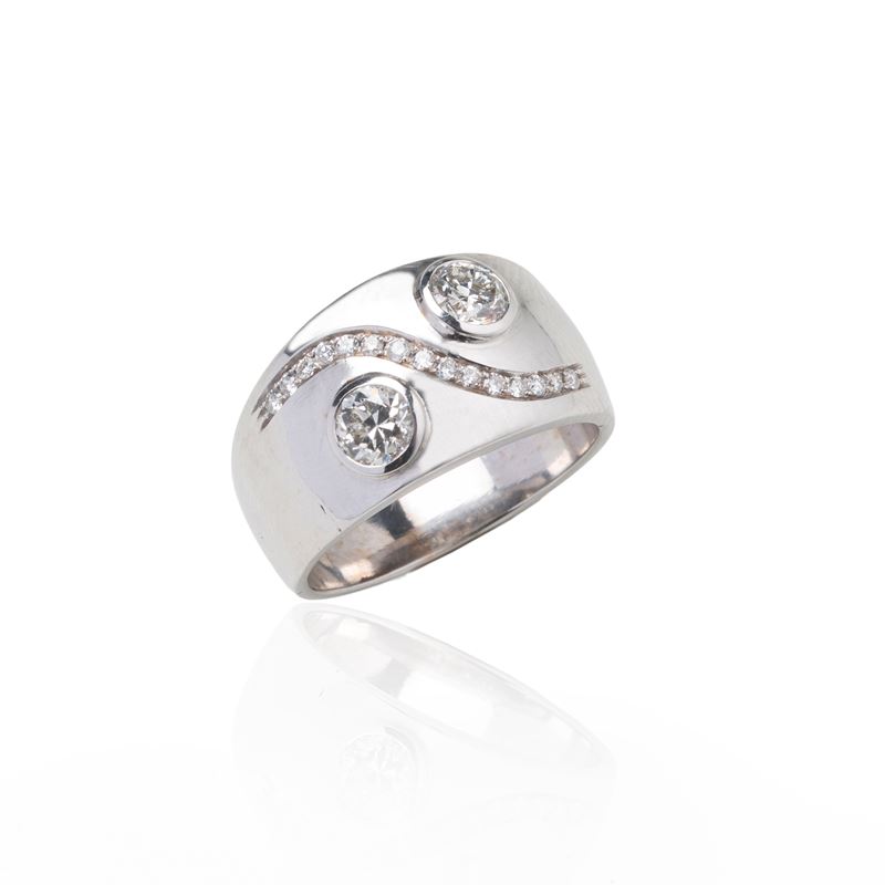 Anello a fascia in oro bianco 18 kt e diamanti
