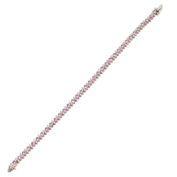 Tennis bracelet in 18 kt white gold, diamonds and pink sapphires