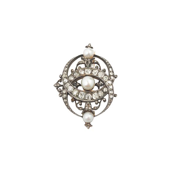 Brooch in low gold, silver, diamonds and pearls