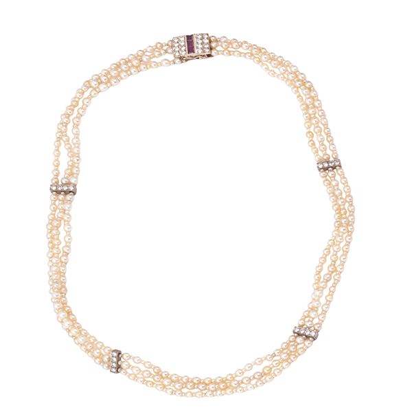 18 kt white gold necklace, natural micropearls, diamonds and rubies