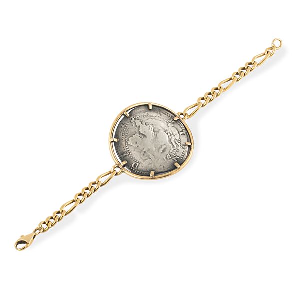 18 kt yellow gold link bracelet and silver medal