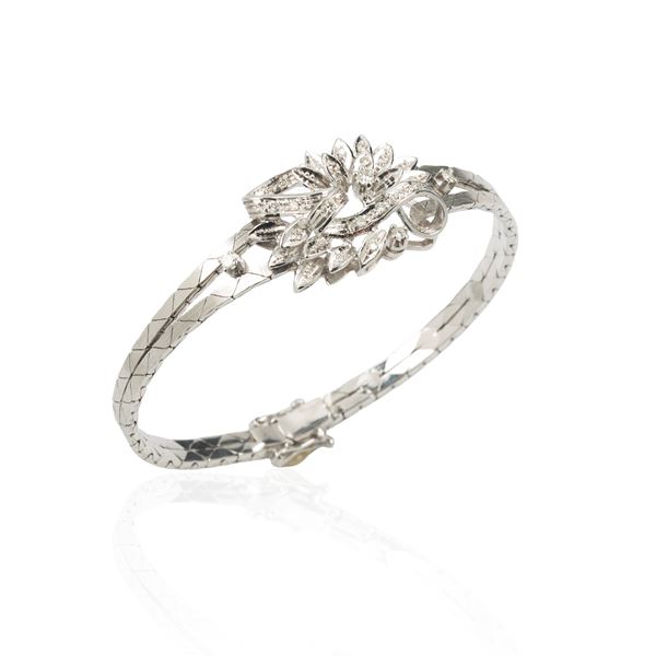Floral bracelet in 18 kt white gold and diamonds