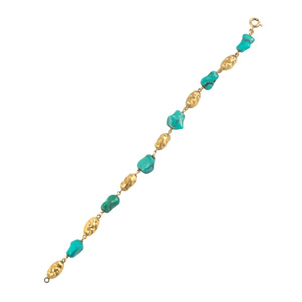 18kt yellow gold link bracelet with gold and turquoise nuggets
