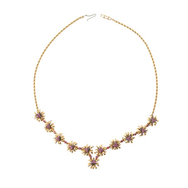 Floral necklace in 18 kt yellow gold and rubies