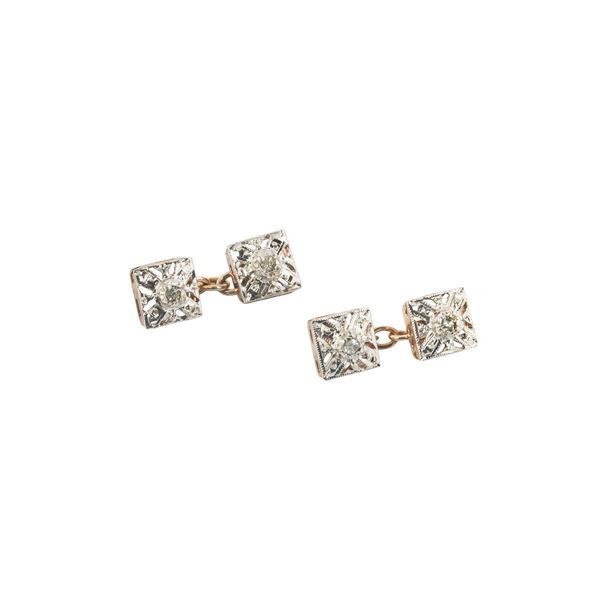 Pair of floral-inspired cufflinks in low gold, silver and diamonds