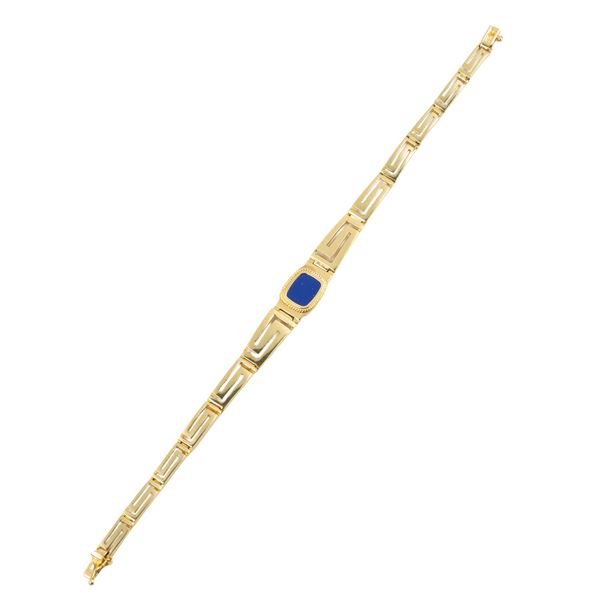 Geometric link bracelet in 14 kt gold and lipis lazuli