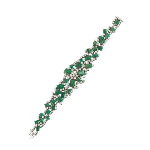 Large bracelet in 18 kt white gold, diamonds and emeralds