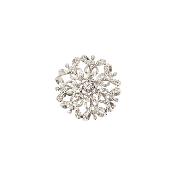 Circular brooch in 18 kt white gold and diamonds